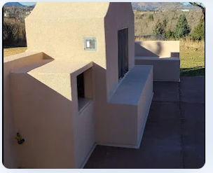 Stucco courtyard walls with mountain view